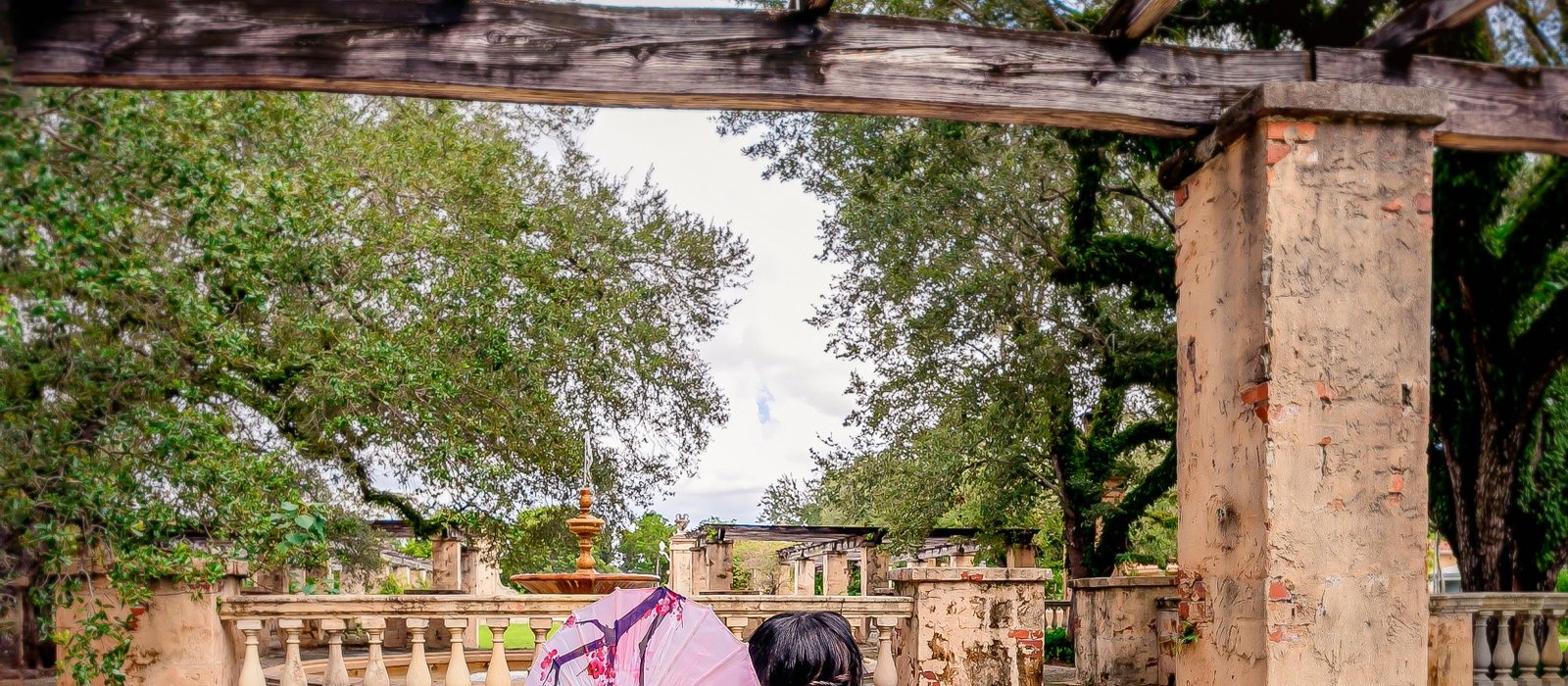 Chilen in a lavender gown on the steps at Vizcaya